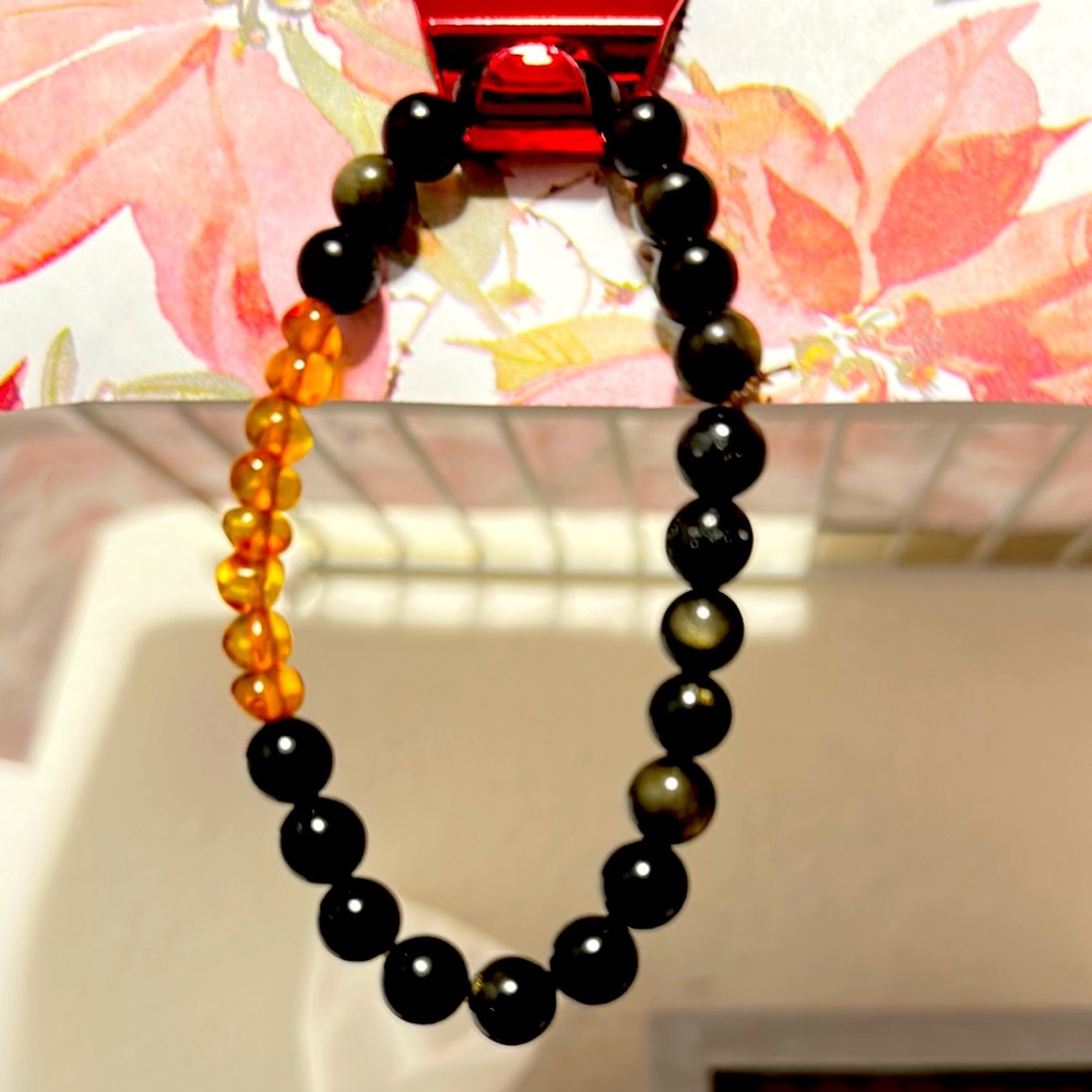 Black obsiden and Amber Beaded Bracelet size 8 elastic